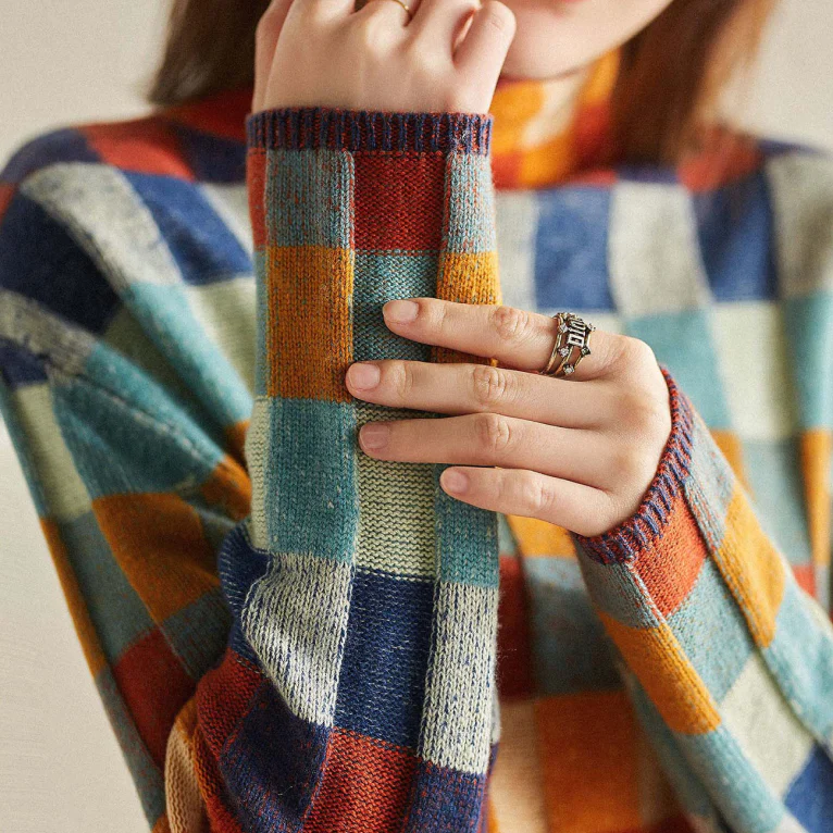 Adalynn | Colorful turtleneck sweater with patchwork pattern